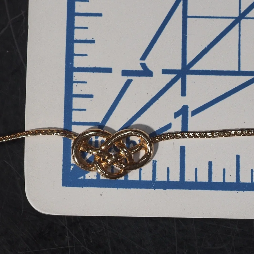 Avon Choker Necklace Interlocking Love Knot Gold Tone Curb Chain Link Vintage